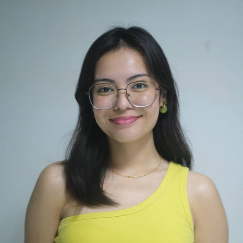 Me wearing a yellow top
