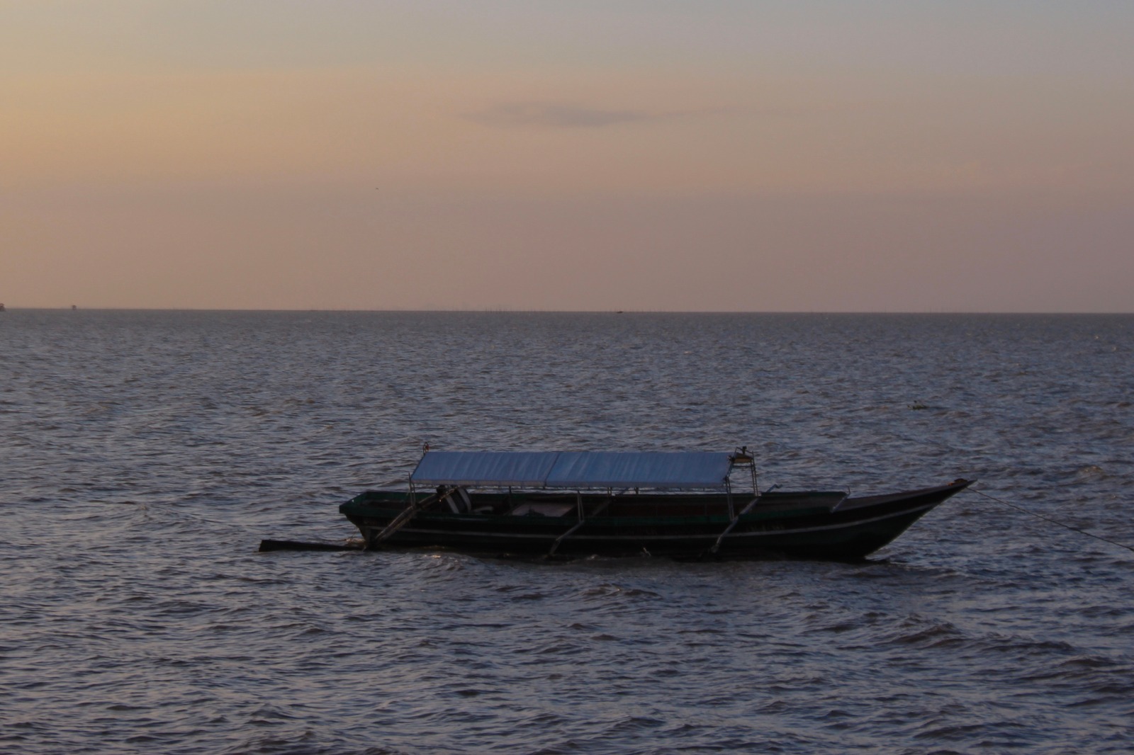 Laguna de Bay with a boat on an almost sunset setting